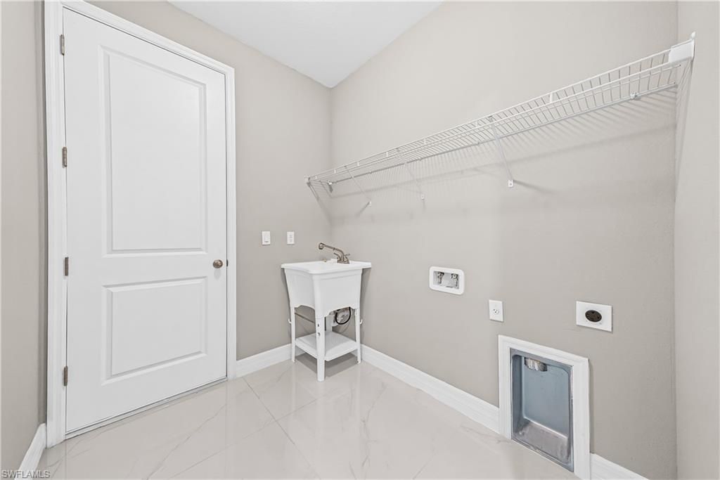 1032 Milwaukee Blvd , Lehigh Acres, FL 33974 Photo