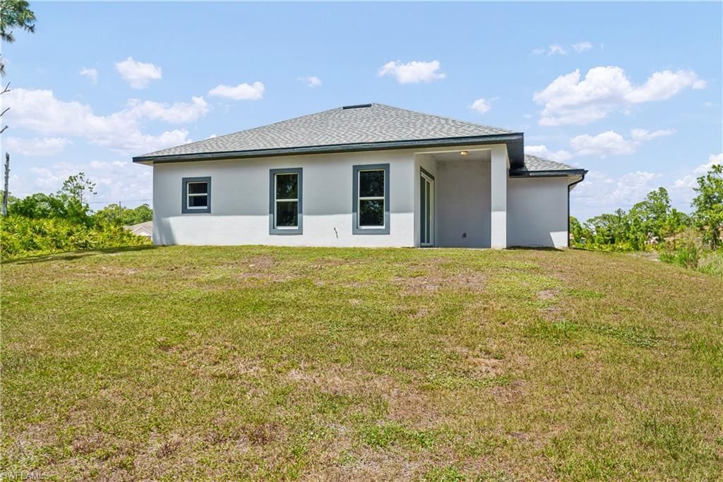 1032 Milwaukee Blvd , Lehigh Acres, FL 33974 Photo