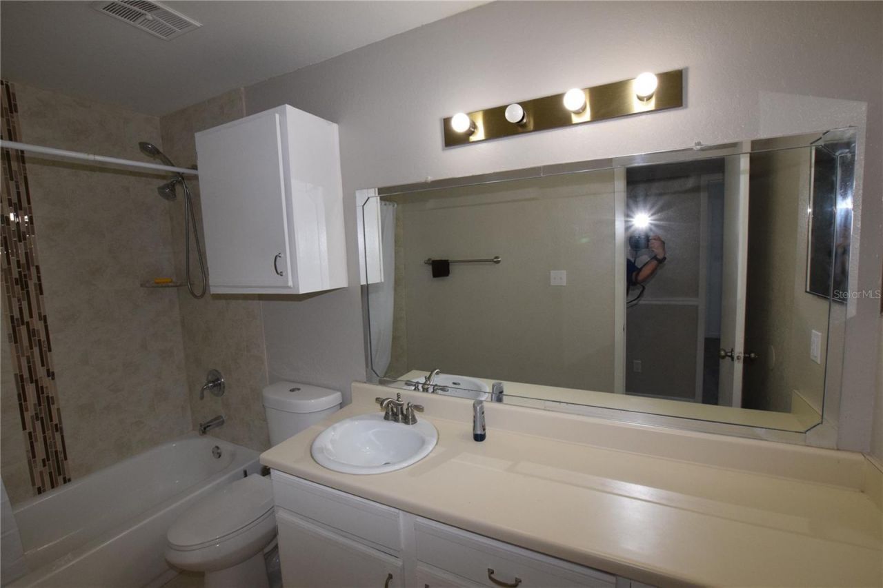 5533 Chrishire Way , Unit F201, Orlando, FL 32822 Photo