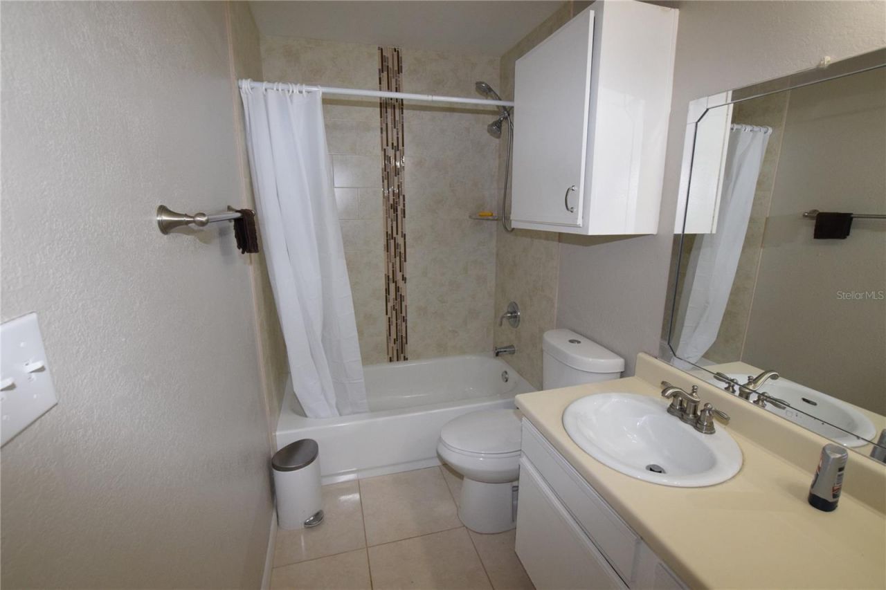 5533 Chrishire Way , Unit F201, Orlando, FL 32822 Photo