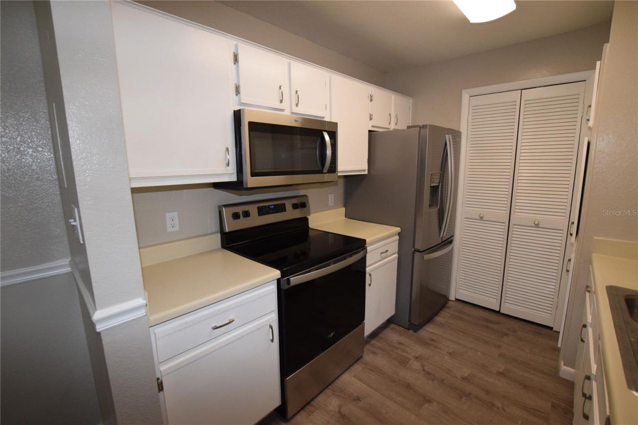 5533 Chrishire Way , Unit F201, Orlando, FL 32822 Photo