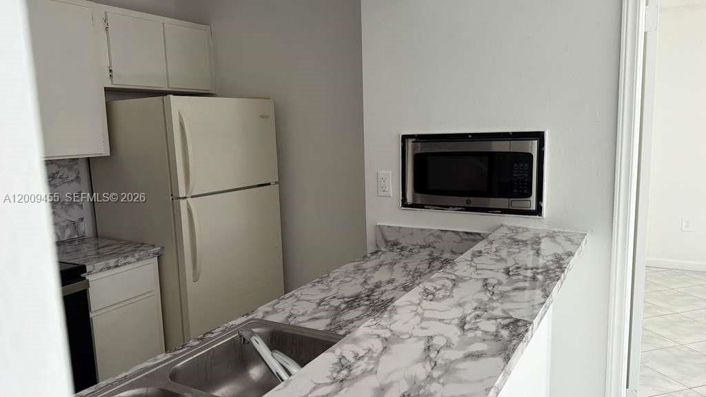 6995 NW 186th St , Unit E507, Hialeah, FL 33015 Photo