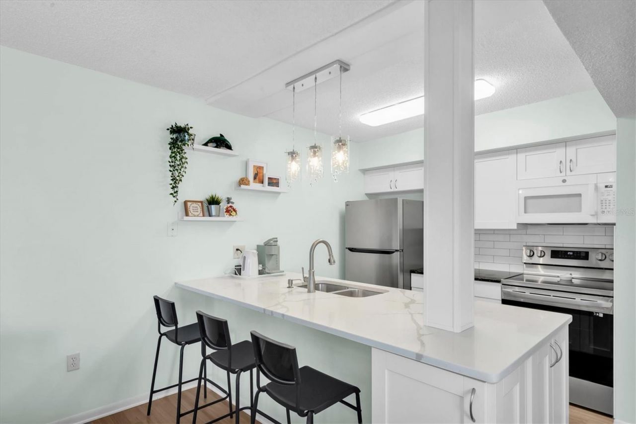 247 Rex Place , Unit H, Madeira Beach, FL 33708 Photo
