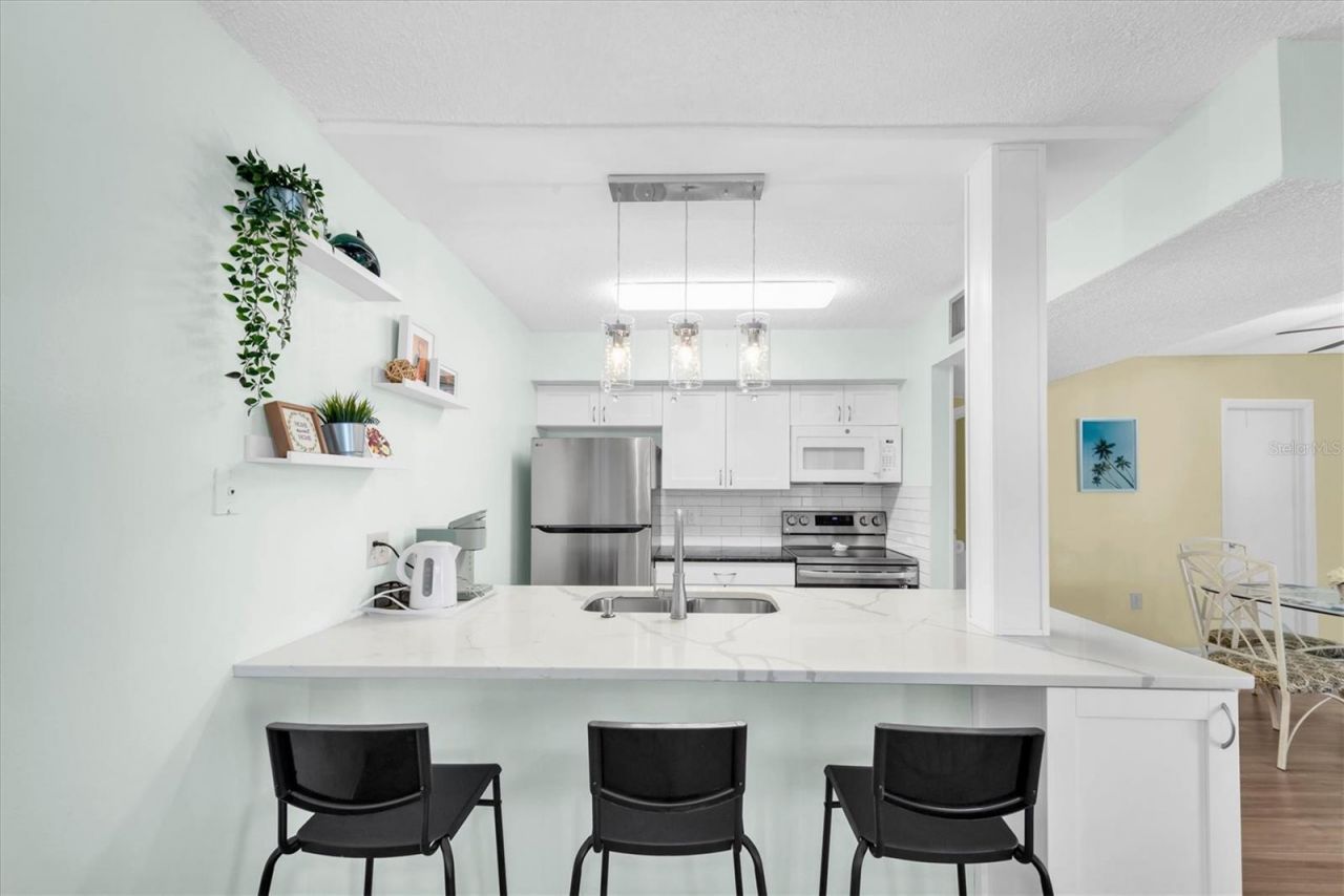 247 Rex Place , Unit H, Madeira Beach, FL 33708 Photo