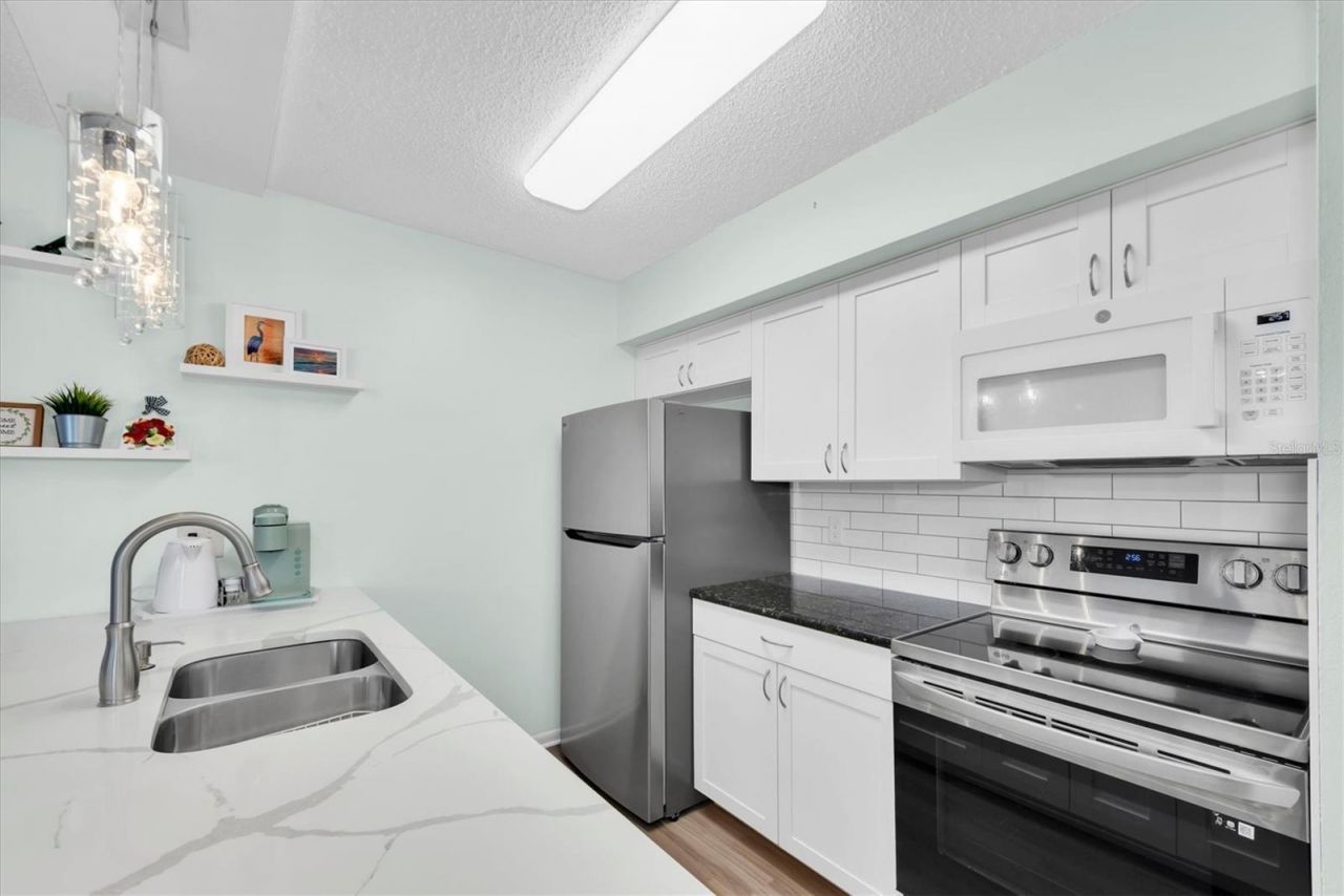 247 Rex Place , Unit H, Madeira Beach, FL 33708 Photo