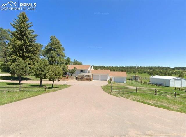 3033 E Palmer Divide Avenue, Larkspur, CO 80118 Main Photo