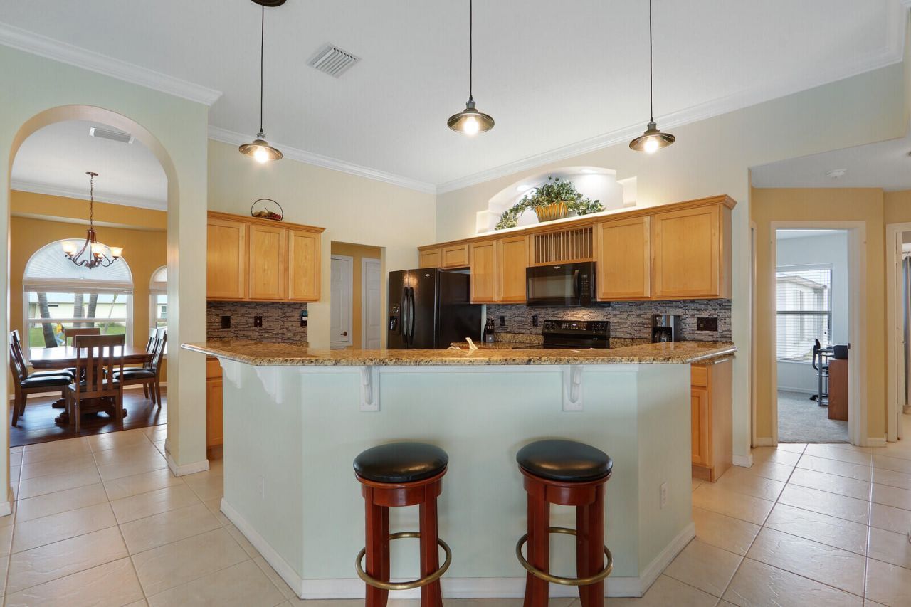 6478 NW Volucia Drive, Port Saint Lucie, FL 34986 Photo