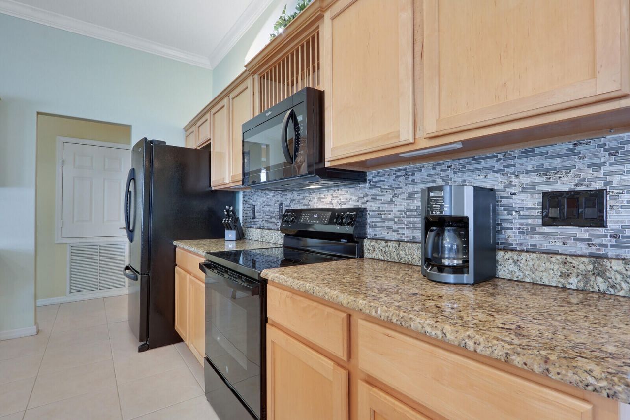 6478 NW Volucia Drive, Port Saint Lucie, FL 34986 Photo