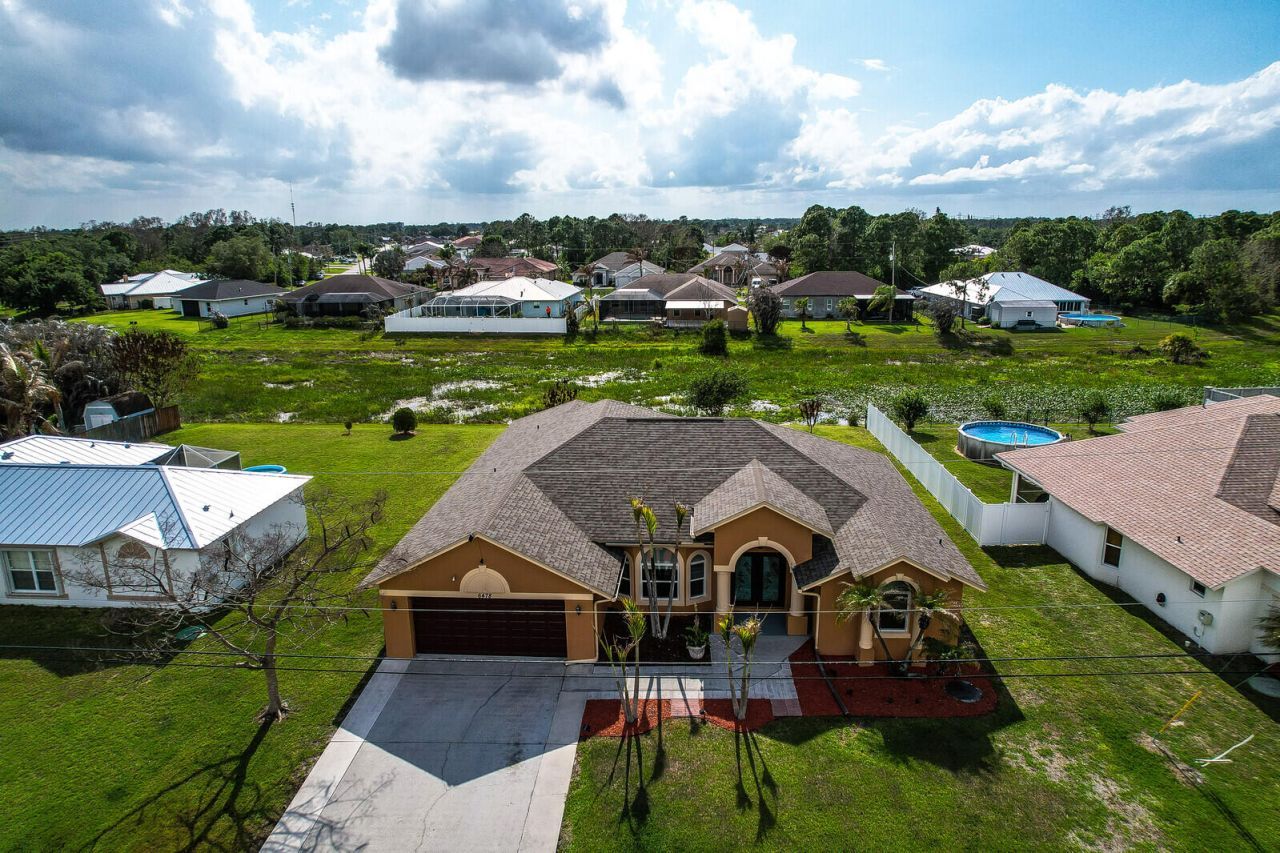 6478 NW Volucia Drive, Port Saint Lucie, FL 34986 Photo