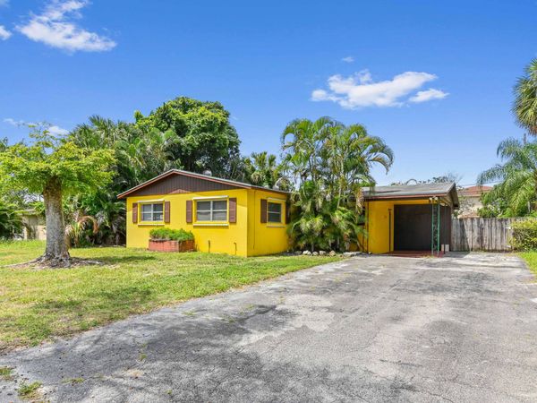 877 Sarazen Drive, Lake Belvedere Estates, FL 33413