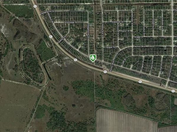 2548 Meadow RD , LEHIGH ACRES, FL 33974