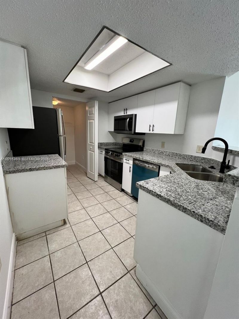 5065 Wiles Rd , Unit 103, Coconut Creek, FL 33073 Photo