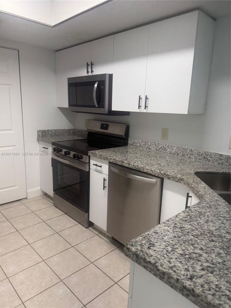 5065 Wiles Rd , Unit 103, Coconut Creek, FL 33073 Photo