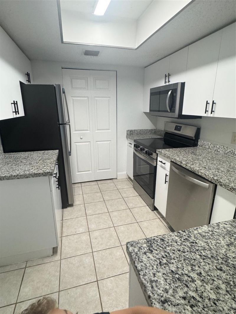 5065 Wiles Rd , Unit 103, Coconut Creek, FL 33073 Photo