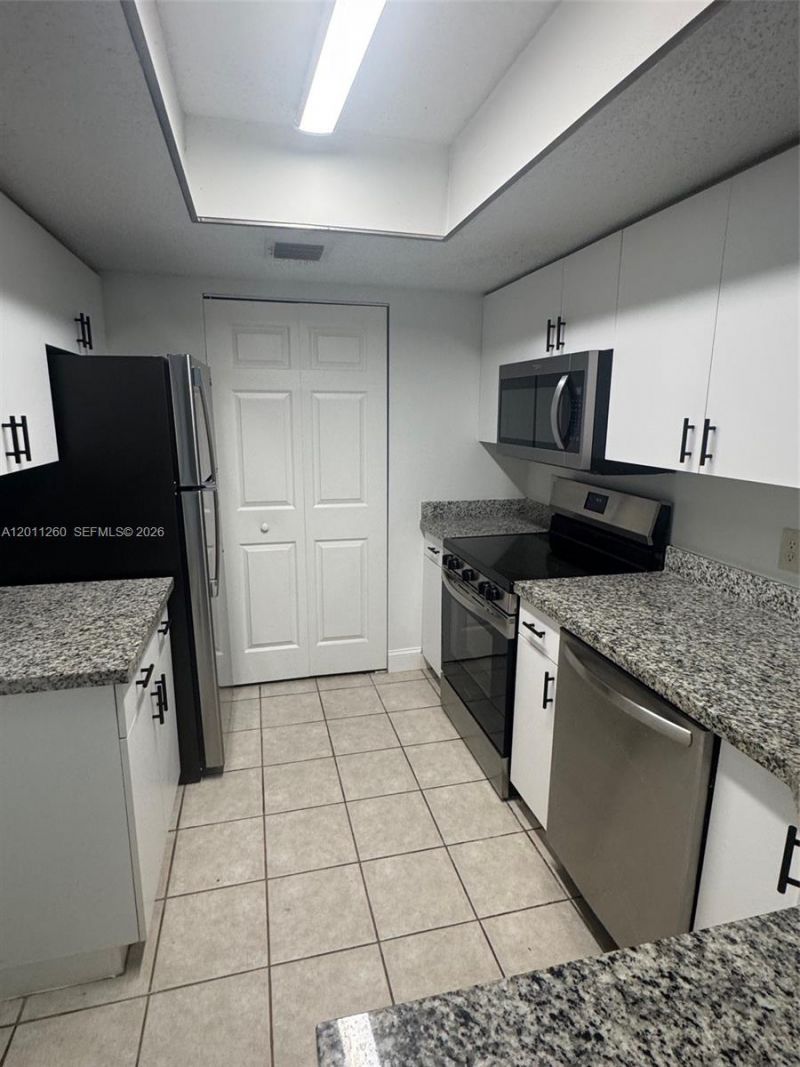 5065 Wiles Rd , Unit 103, Coconut Creek, FL 33073 Photo