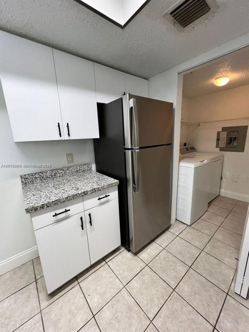 5065 Wiles Rd , Unit 103, Coconut Creek, FL 33073 Photo