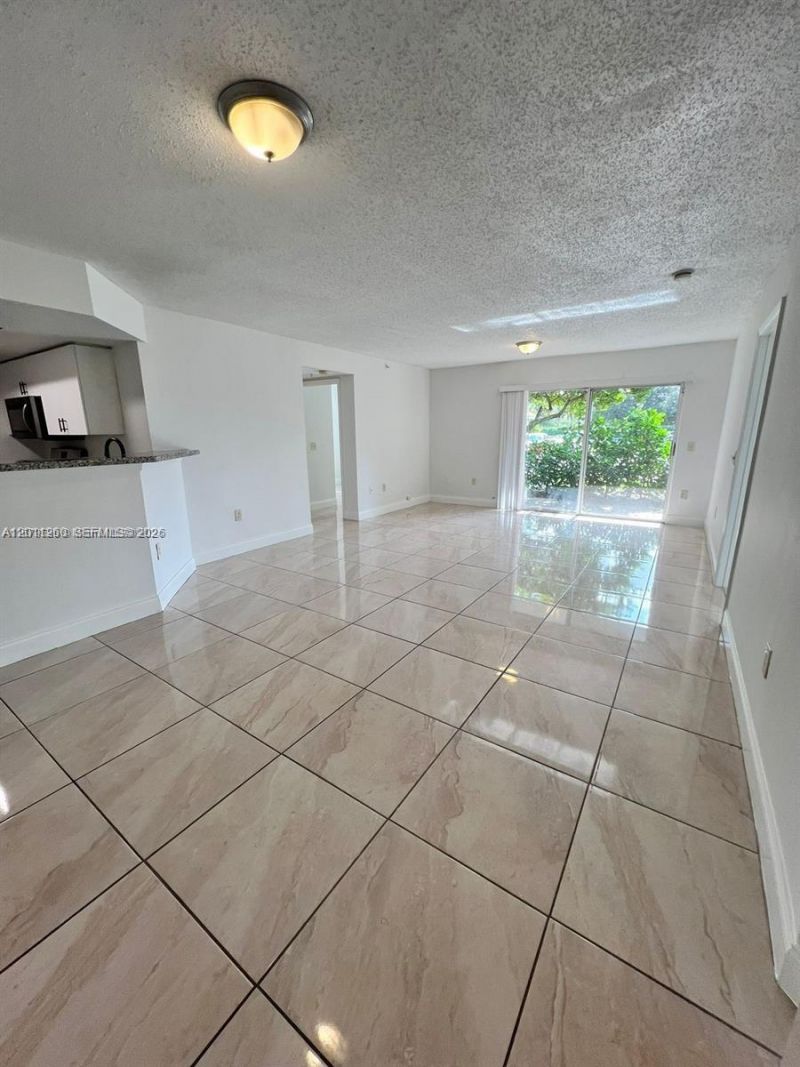 5065 Wiles Rd , Unit 103, Coconut Creek, FL 33073 Photo