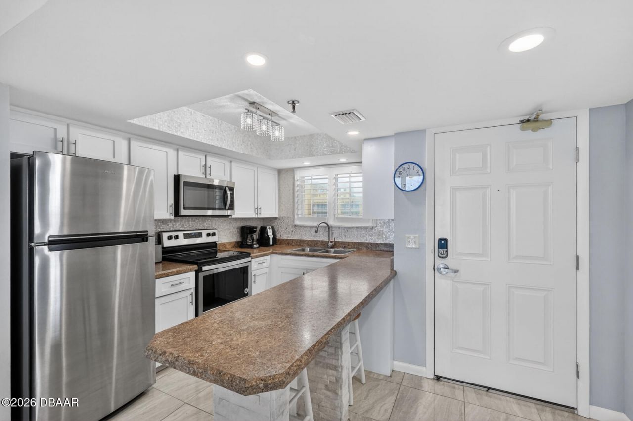 421 S Atlantic Avenue, Unit 409, New Smyrna Beach, FL 32169 Photo