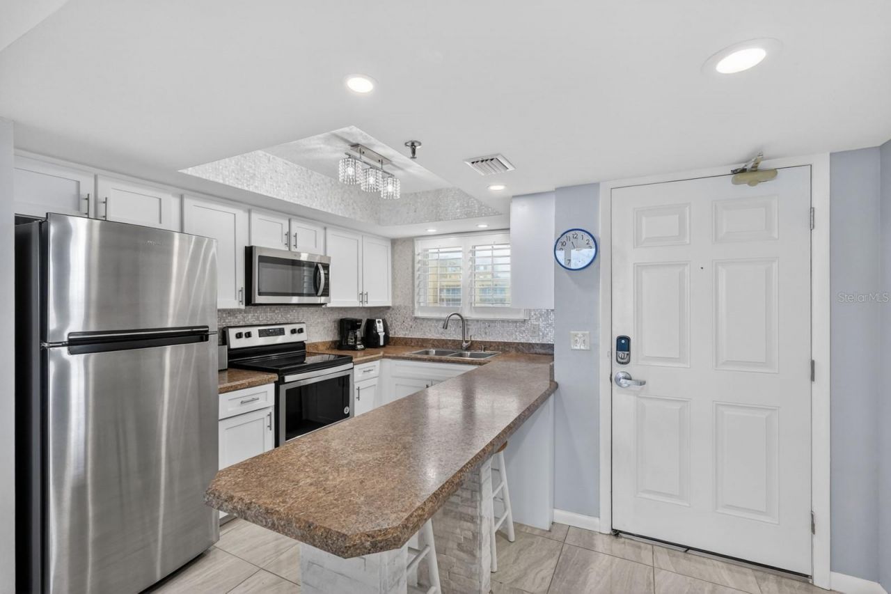 421 S Atlantic Avenue , Unit 409, New Smyrna Beach, FL 32169 Photo