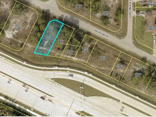 1100 MEADOW ROAD , LEHIGH ACRES, FL 33973