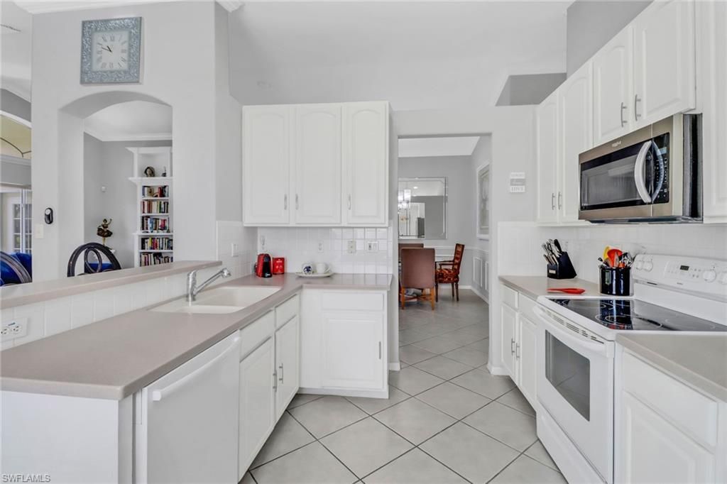 7477 Lourdes Ct , Naples, FL 34104 Photo