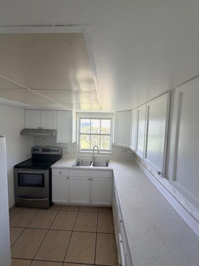 5443 Cresthaven Boulevard, Unit F, West Palm Beach, FL 33415 Photo