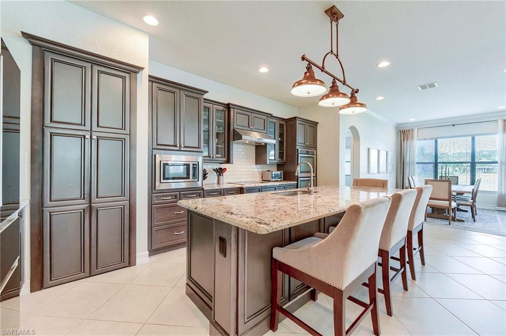 9335 Woodhurst Dr, Naples, FL 34120 Photo