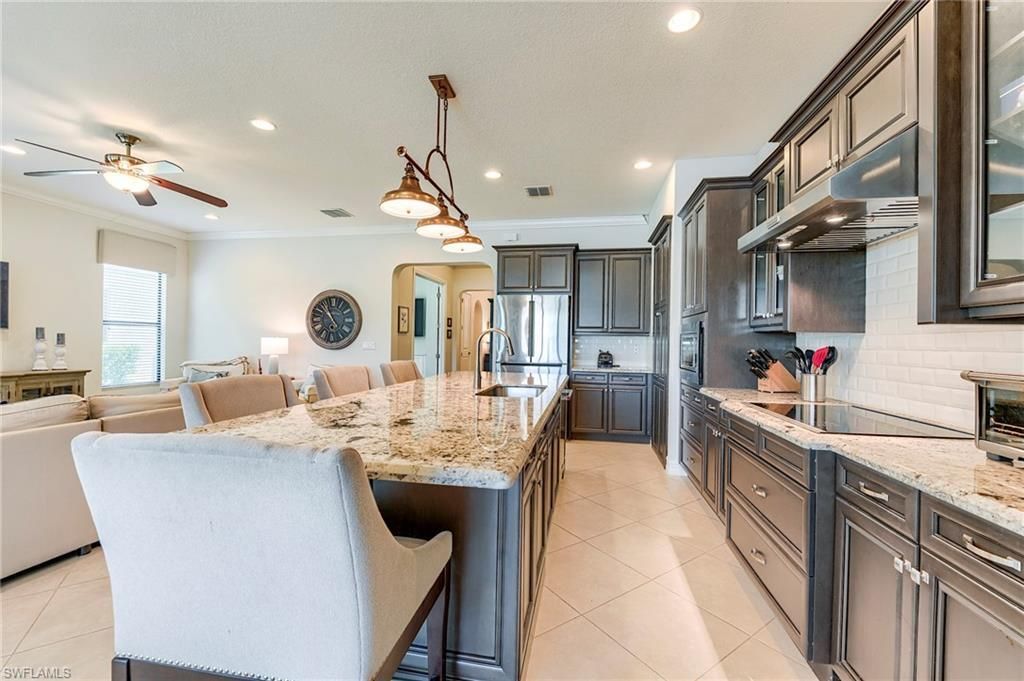 9335 Woodhurst Dr, Naples, FL 34120 Photo