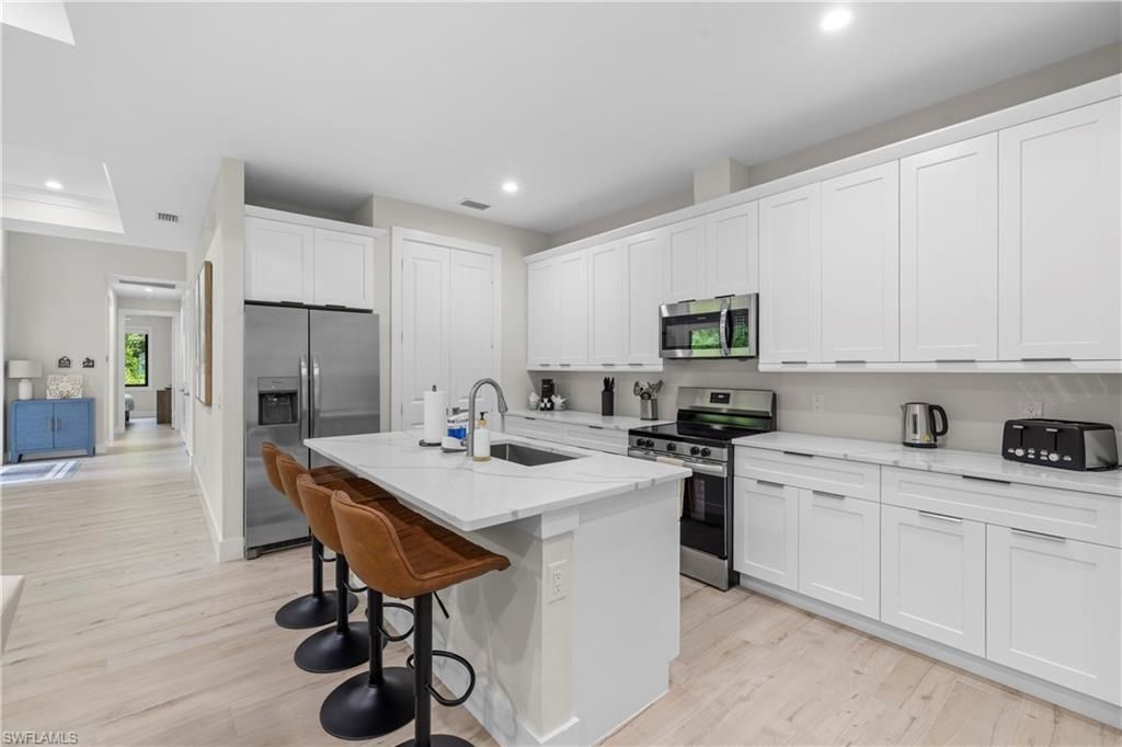3012 Pine Tree Dr , Naples, FL 34112 Photo