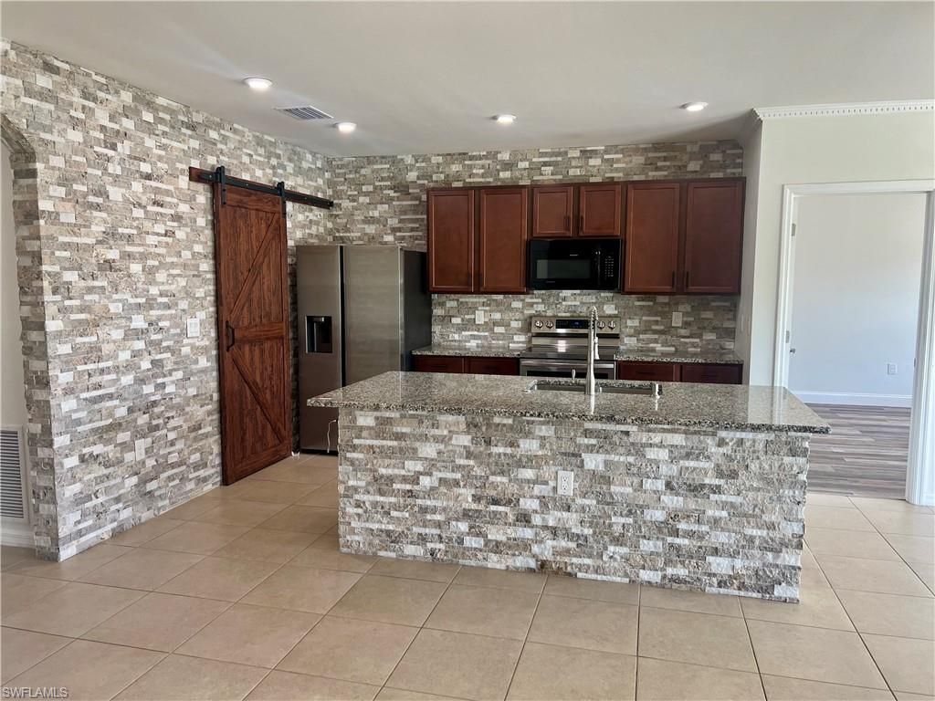 10293 Silver Pond Ln , Lehigh Acres, FL 33936 Photo