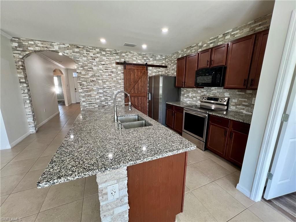 10293 Silver Pond Ln , Lehigh Acres, FL 33936 Photo