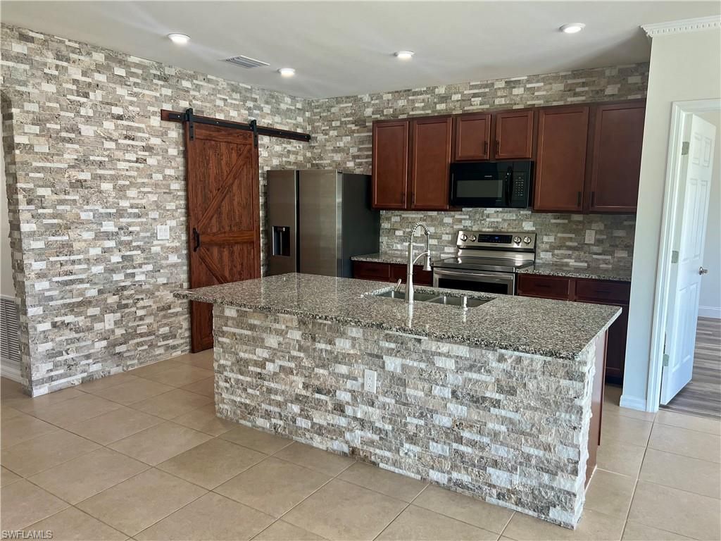 10293 Silver Pond Ln , Lehigh Acres, FL 33936 Photo