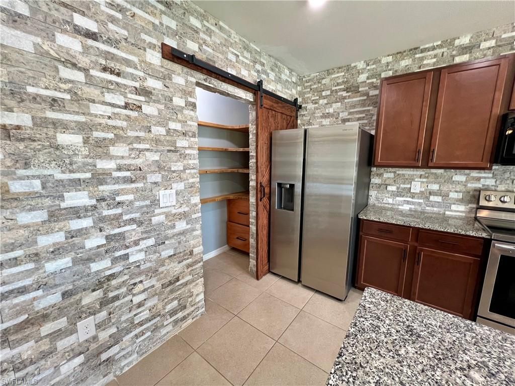 10293 Silver Pond Ln , Lehigh Acres, FL 33936 Photo