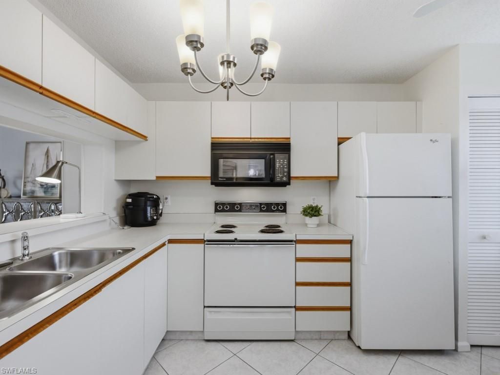 5970 Amherst Dr , Unit C203, Naples, FL 34112 Photo