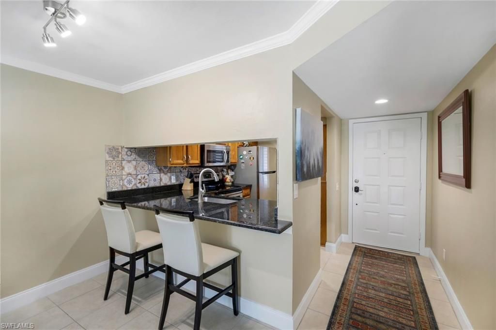 5857 Rattlesnake Hammock Rd , Unit 107, Naples, FL 34113 Photo