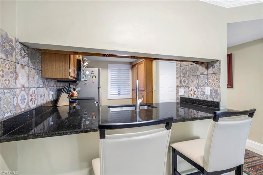 5857 Rattlesnake Hammock Rd , Unit 107, Naples, FL 34113 Photo