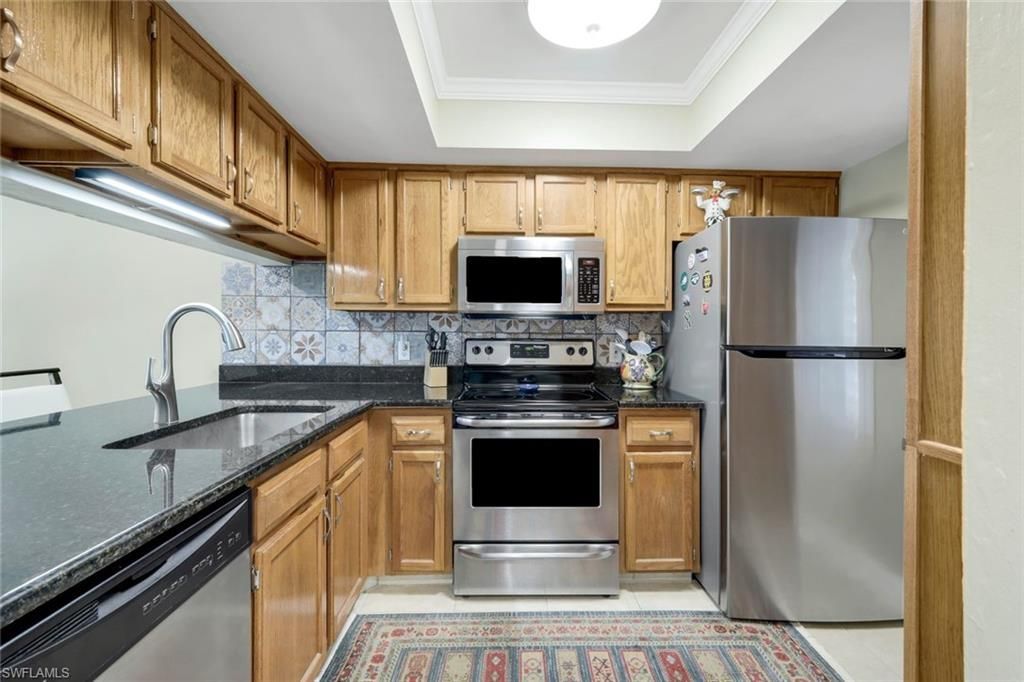 5857 Rattlesnake Hammock Rd , Unit 107, Naples, FL 34113 Photo