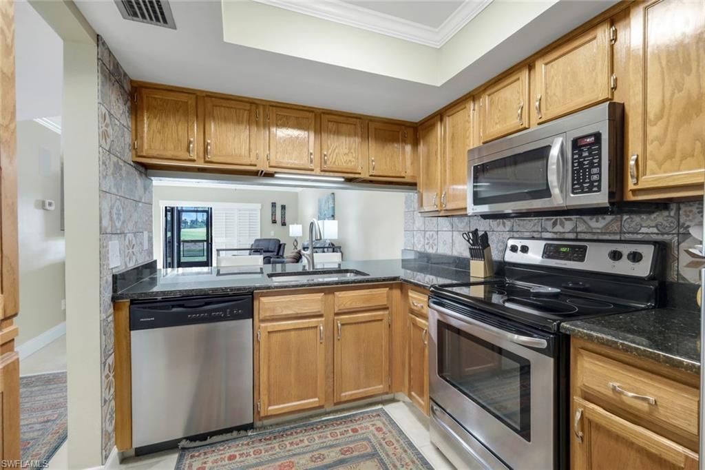 5857 Rattlesnake Hammock Rd , Unit 107, Naples, FL 34113 Photo