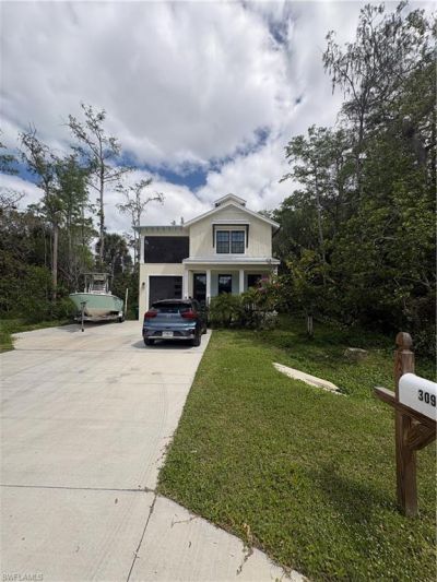 3123 Pine Tree Dr, Naples, FL 34112 Photo