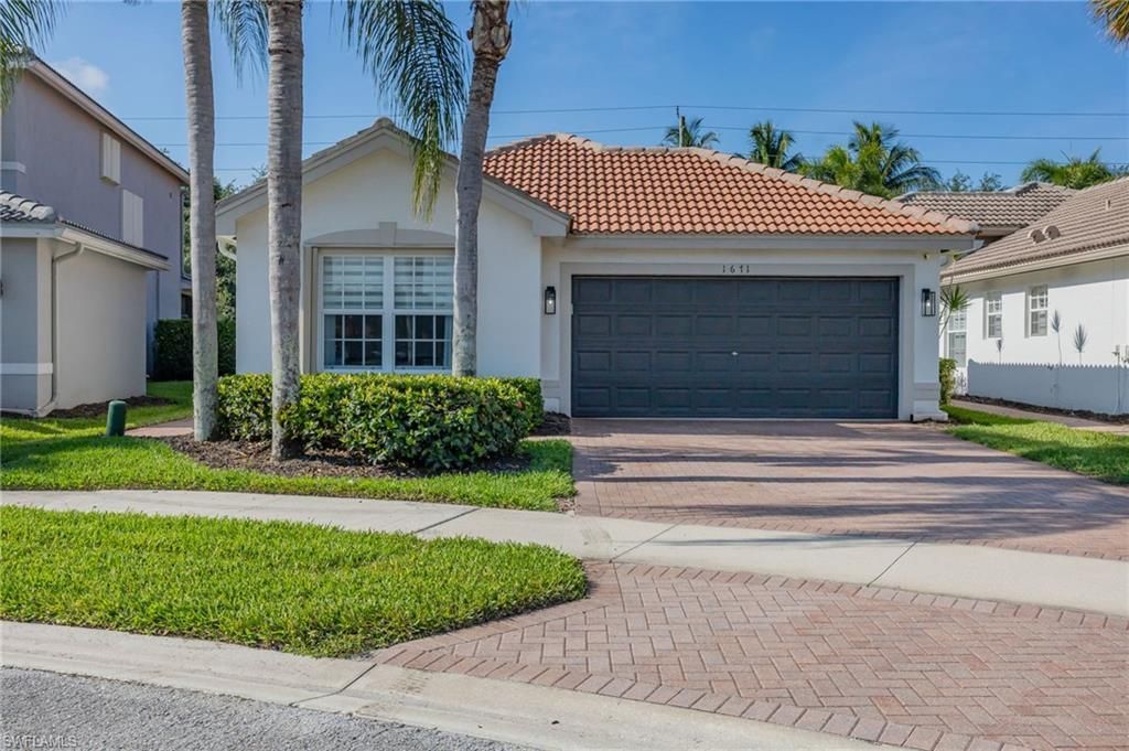 1671 Triangle Palm Ter, Naples, FL 34119 Photo