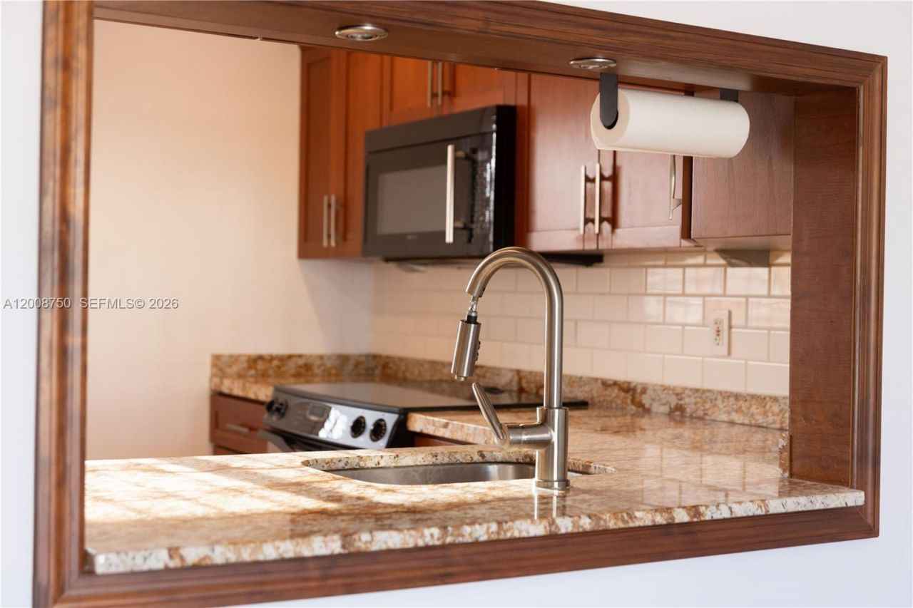 7703 Camino Real, Unit 406, Miami, FL 33143 Photo