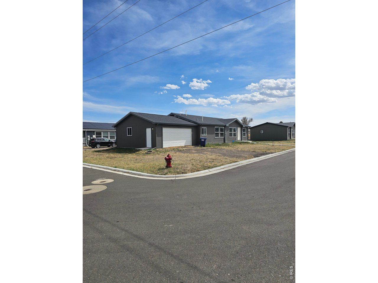 113 Juniper Cir, Log Lane Village, CO 80705 Main Photo
