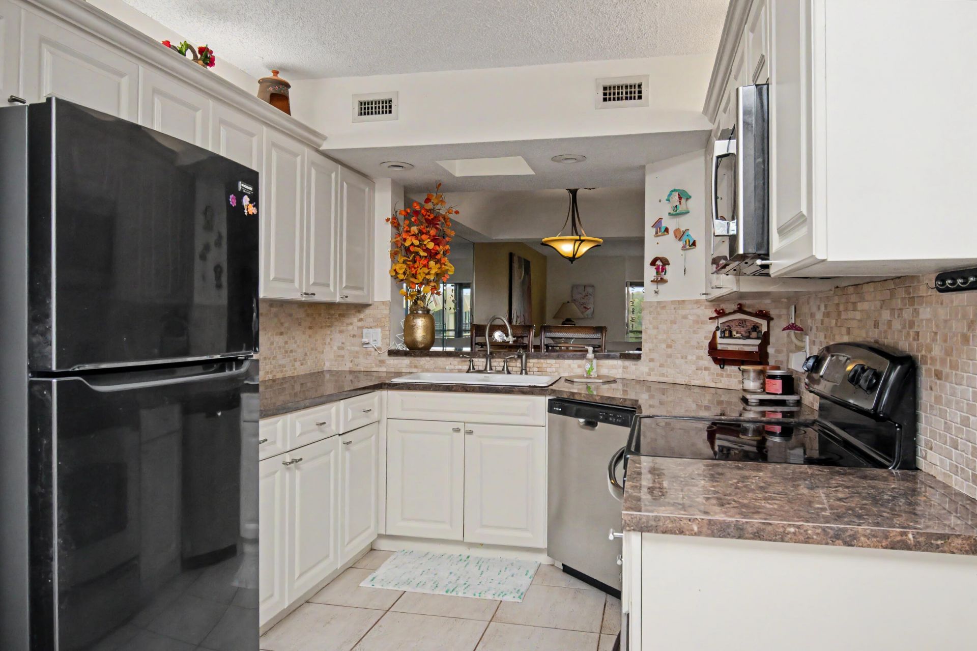 23370 N Carolwood Lane N, Unit 409, Boca Raton, FL 33428 Photo