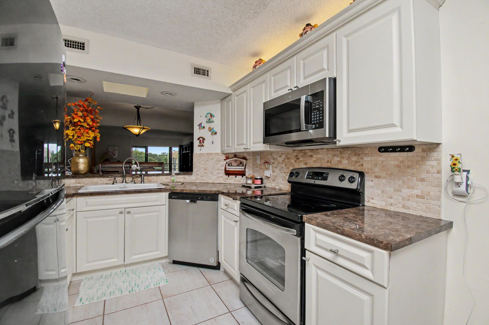 23370 N Carolwood Lane N, Unit 409, Boca Raton, FL 33428 Photo