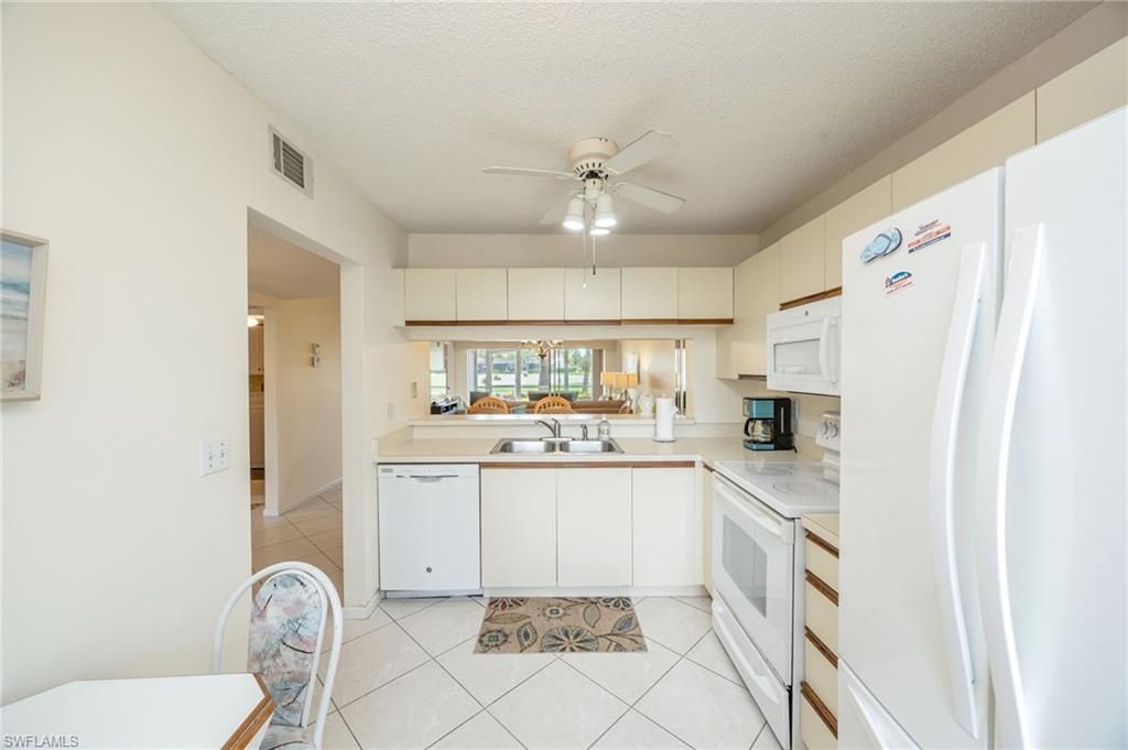 5950 Amherst Dr , Unit A101, Naples, FL 34112 Photo