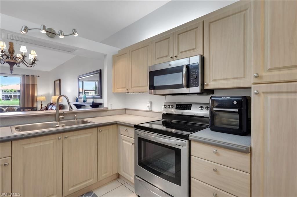 320 Robin Hood Cir, Unit 101, Naples, FL 34104 Photo