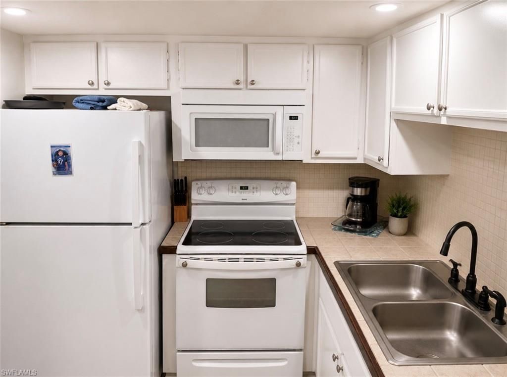102 E Greens Blvd, Lehigh Acres, FL 33936 Photo
