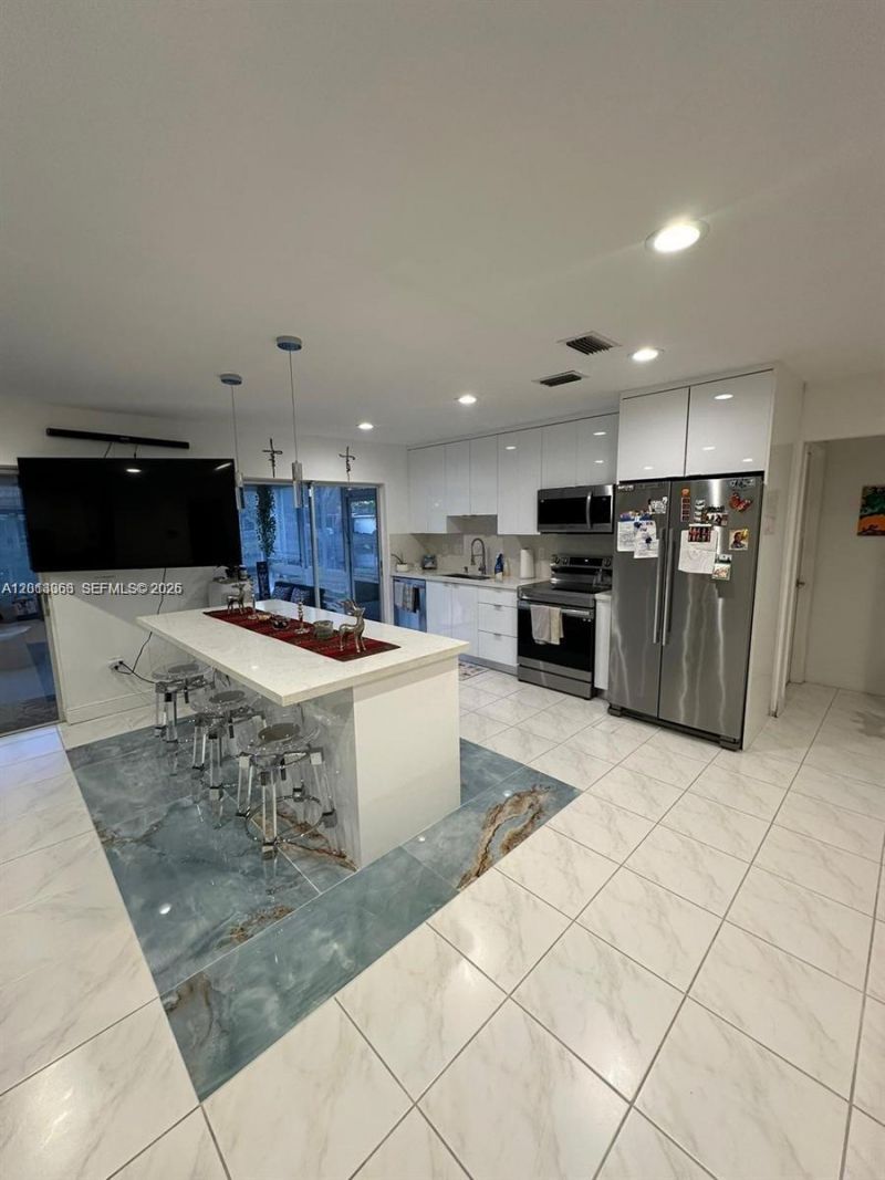 9590 NW 24th Pl , Sunrise, FL 33322 Photo