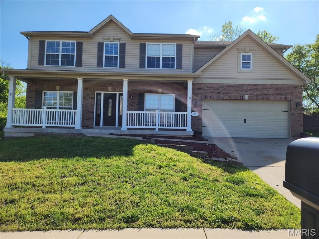 59 Charbonier Bluffs Drive , Florissant, MO 63031 Main Photo