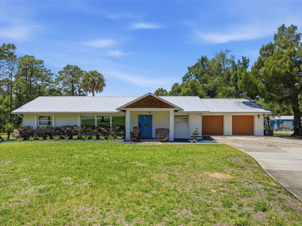 37237 GRAYS AIRPORT ROAD, LADY LAKE, FL 32159